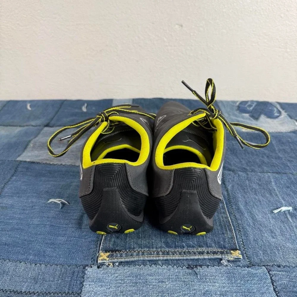Puma black and yellow sneakers